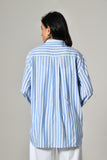 Designer blue shirt for women – linen striped shirt with pleated details, ideal for summer office wear and stylish workwear.