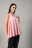 Breathable pink A-line dress in cotton fabric featuring front pleat for added shape – great for workwear or casual looks.