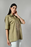 Embroidered cotton shirt for women with geometric motifs – casual formal top blending ethnic style and contemporary flair.