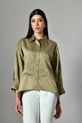 Embellished cotton shirt for women – stylish long sleeve casual top with bead work, ideal for festive or partywear looks.