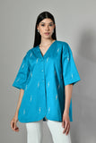 Relaxed fit embroidered cotton tunic for women – casual summer shirt with V-neck and abstract design for a modern look.
