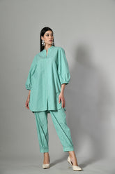 Green cotton co ord set for women – striped two-piece summer outfit perfect for casual wear or beach vacations.