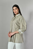 Elegant tunic-style shirt for women featuring ethnic-inspired embroidery and pleated front – ideal for workwear.