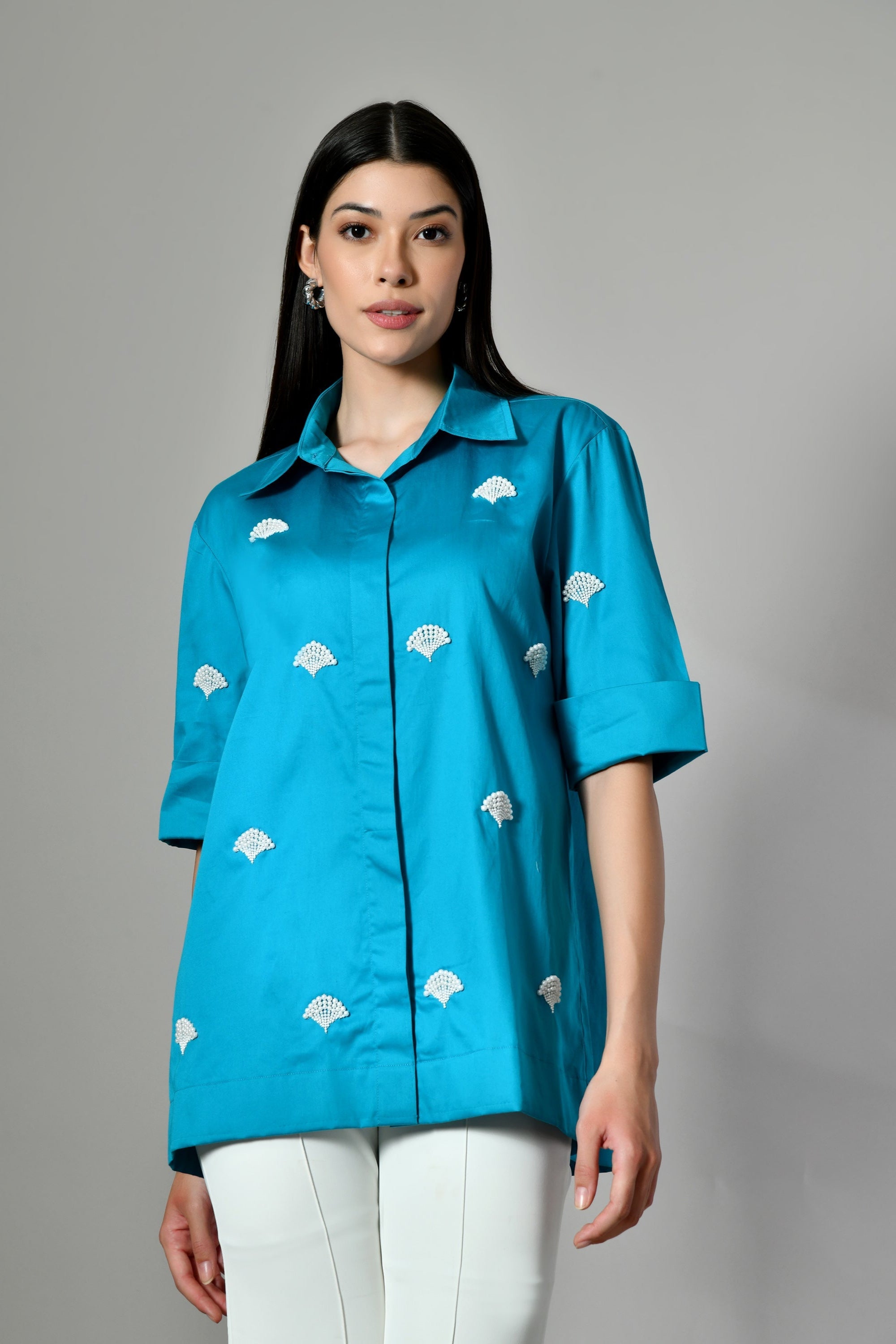 Blue pearl embellished shirt for women – breathable cotton top with hand embroidery, perfect for festive casual wear.