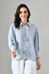 Women’s grey cotton shirt featuring a classic collar, relaxed fit, and ruffled design. Ideal for parties, office wear, or casual summer outings.