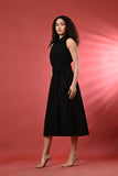 Sleek black sleeveless long dress for women, a stylish choice for cocktail parties.