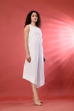 Trendy sleeveless white dress with a sleek design, perfect for summer gatherings.