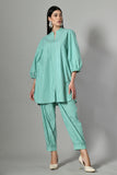 Green cotton co ord set for women – striped two-piece summer outfit perfect for casual wear or beach vacations.