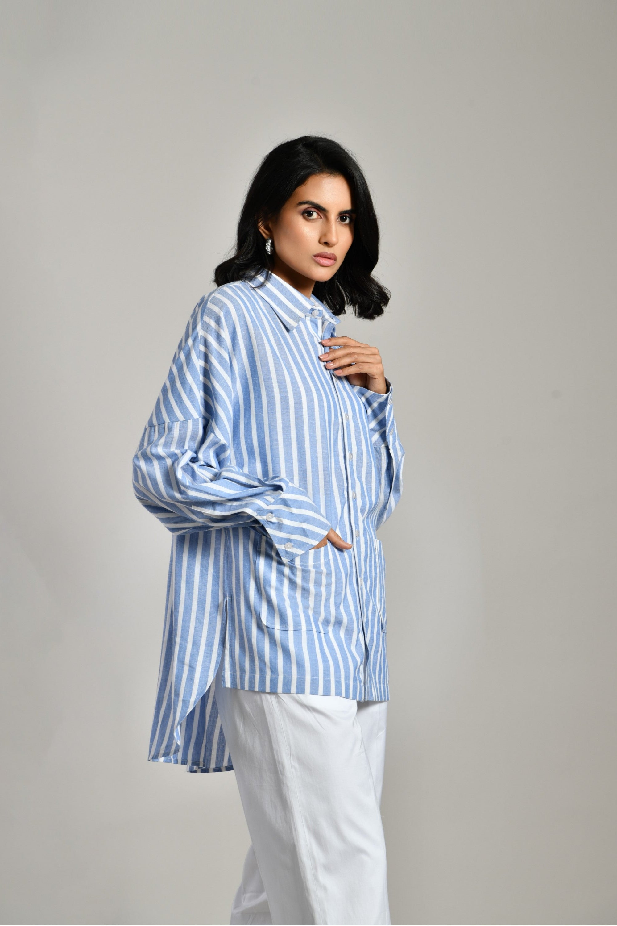 Blue linen shirt with long sleeves and embellishments – casual yet chic shirt for festive and office wear. 