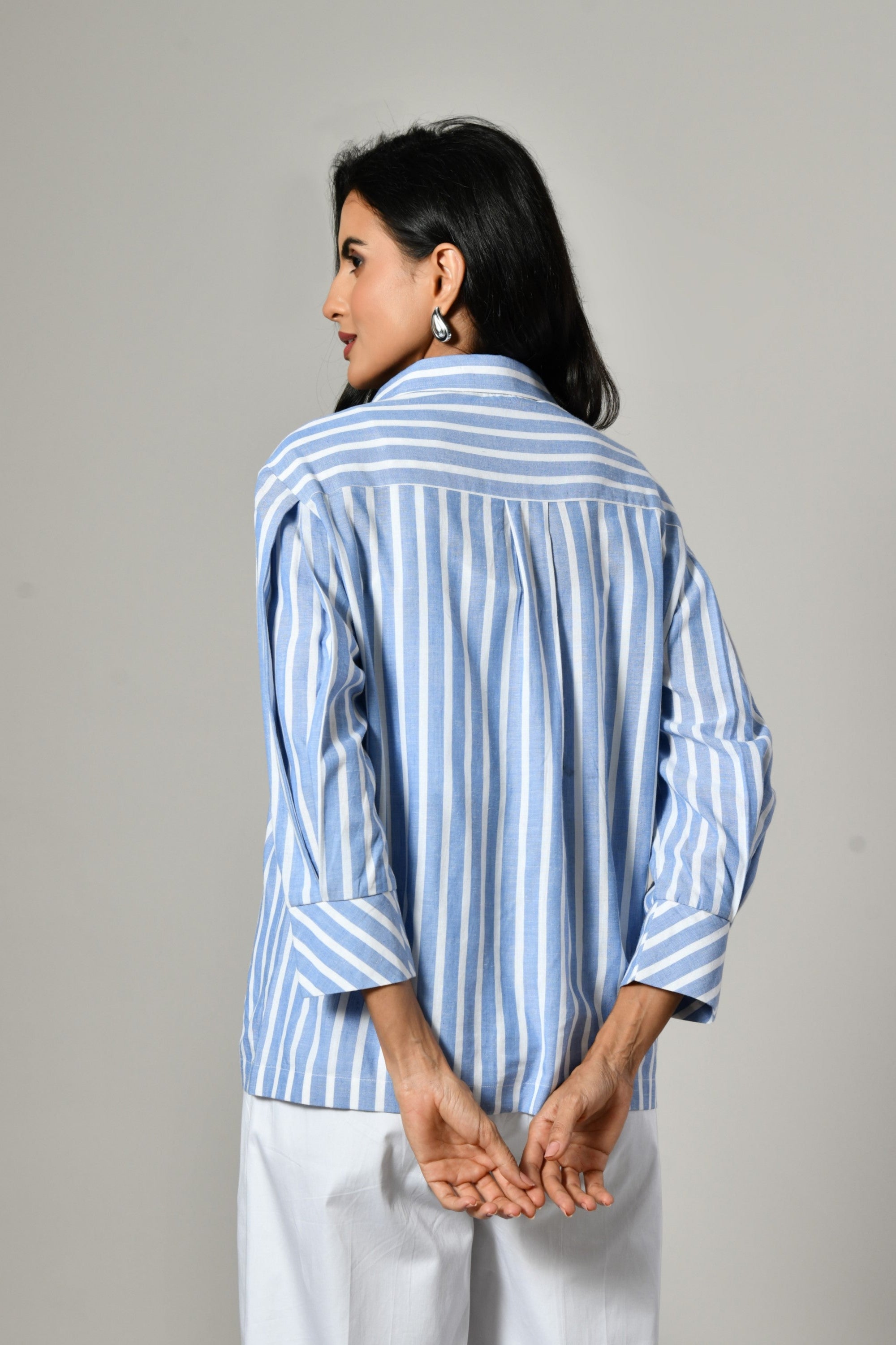 Loose fit blue stripe cotton shirt – collared full sleeve casual shirt for women, ideal for evening wear or party looks. 