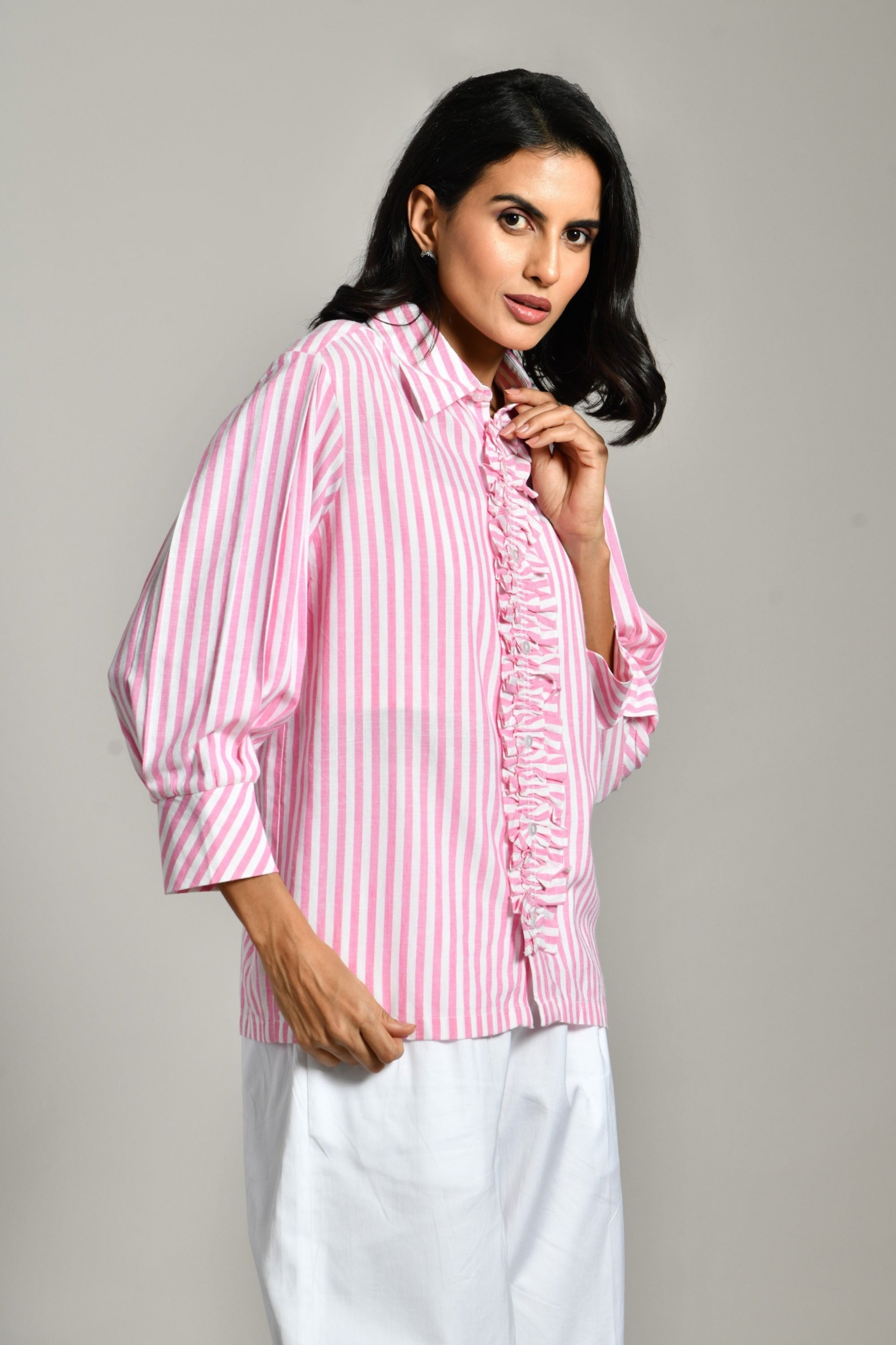 Casual pink linen shirt with ruffle detailing – classic collar tunic for women, available online at Isara and Zara. 