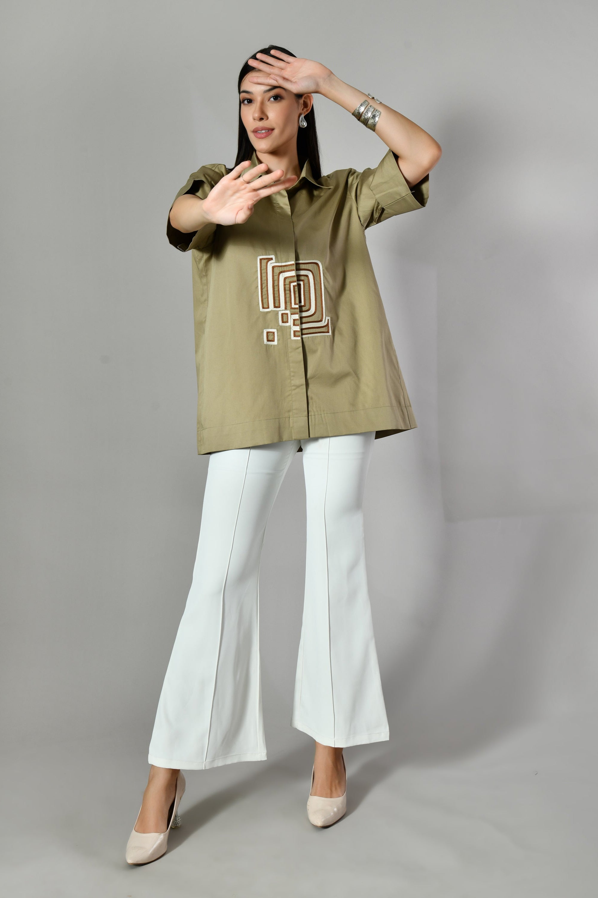 Chic cotton shirt for women with modern art-inspired embroidery– a designer Indo-Western top for fashion-forward office wear.
