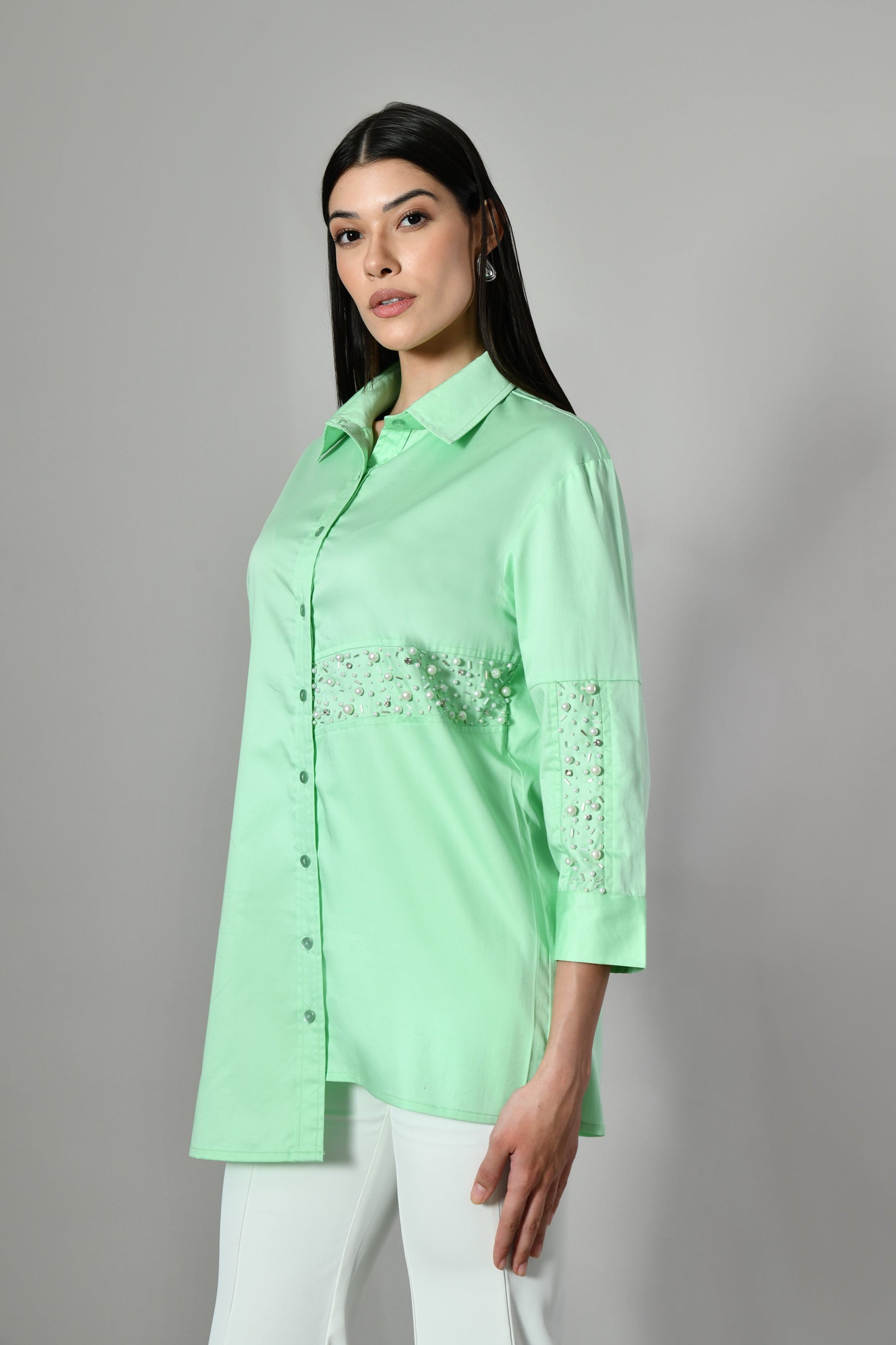 Elegant mint green shirt with pearl embellishments – a stylish casual cotton tunic for women with Indo-western flair. 