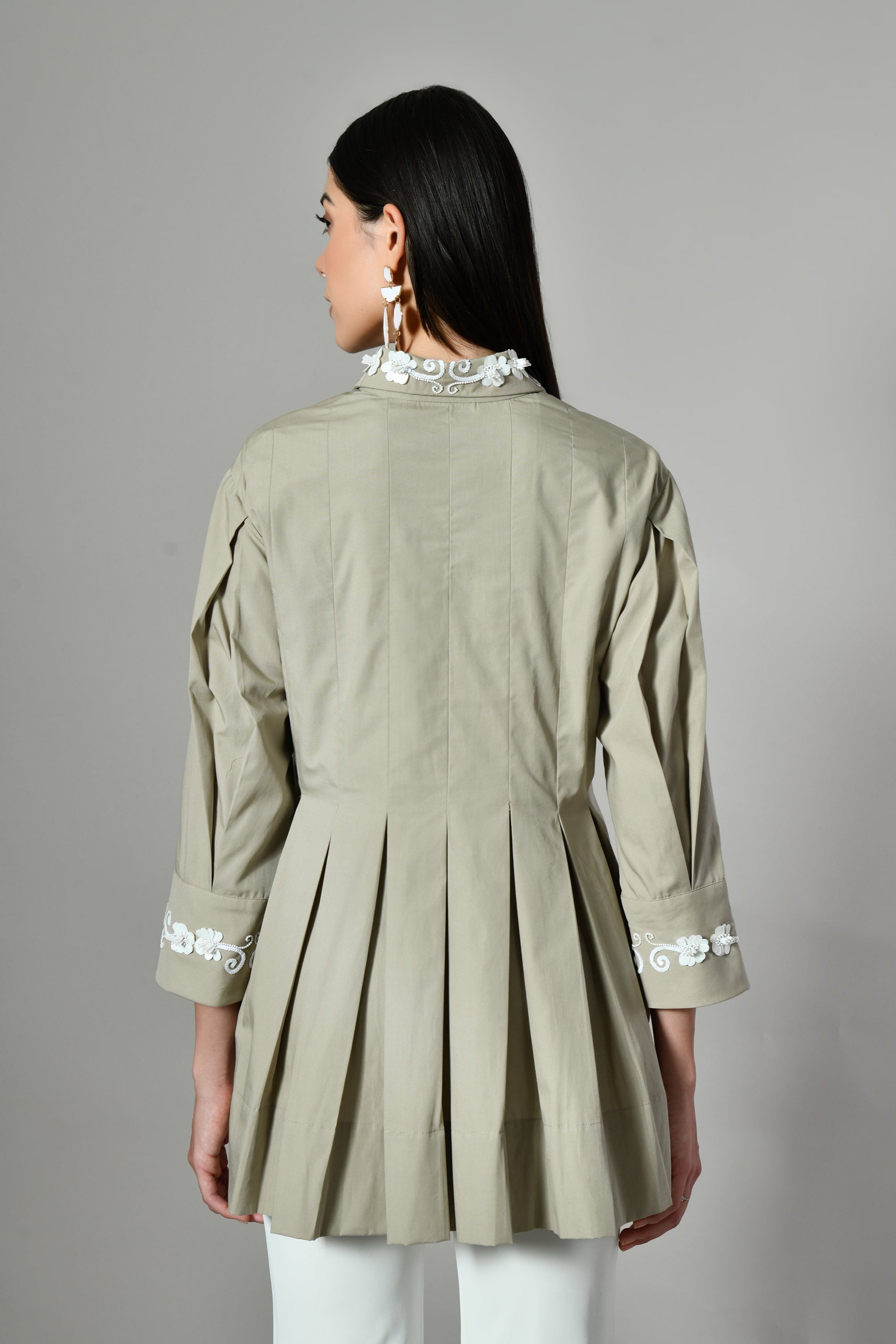 Pleated cotton A-line tunic top with embroidered collar – stylish women’s workwear shirt in elegant ethnic-inspired design.