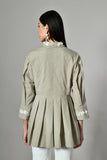Pleated cotton A-line tunic top with embroidered collar – stylish women’s workwear shirt in elegant ethnic-inspired design.