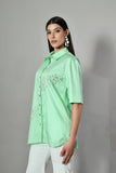 Elegant mint green shirt with pearl detailing–embroidered Indo-Western cotton top for women, available online and in stores. 