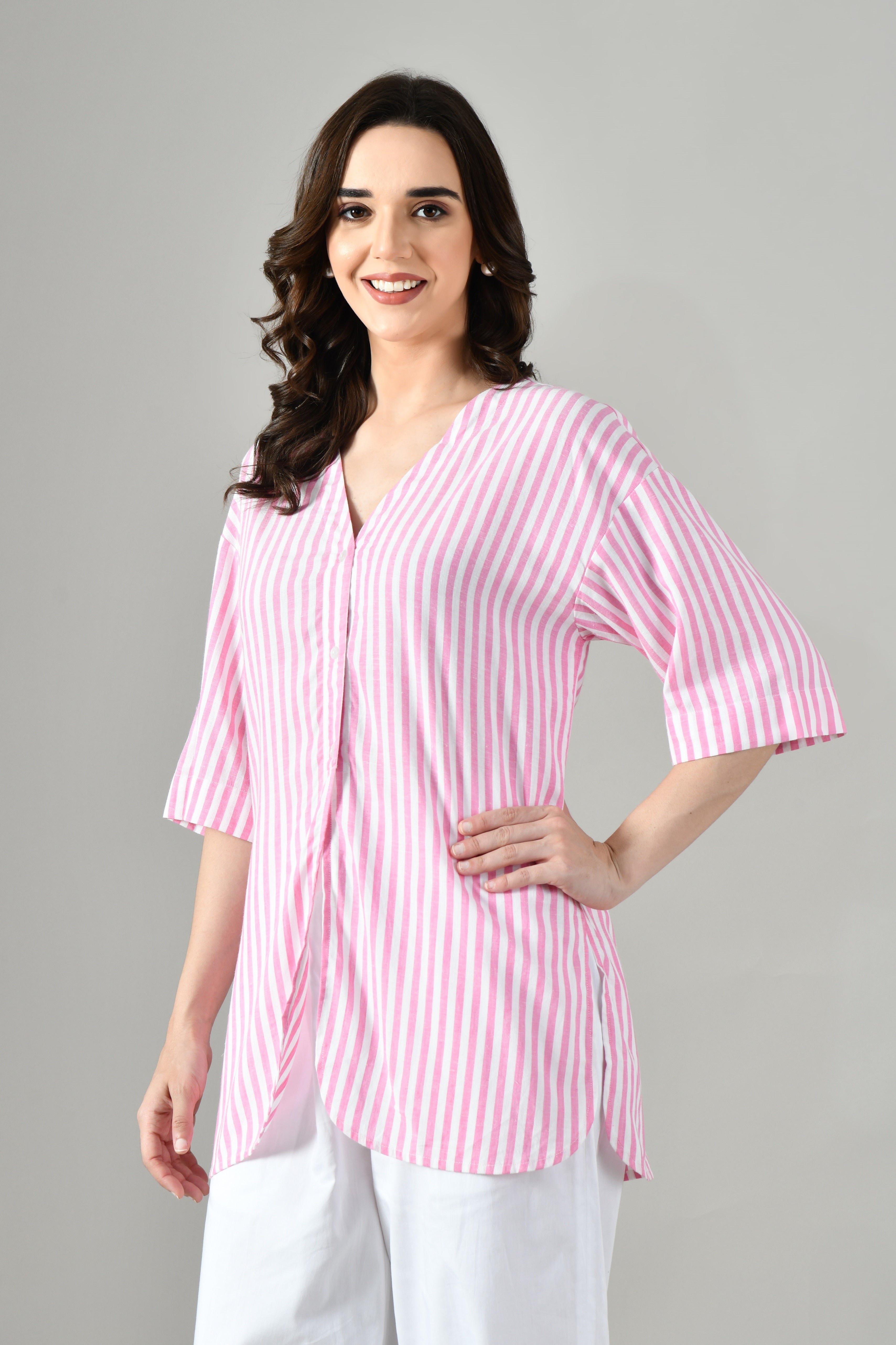 Pink linen shirt with V-neck and button-down front – stylish half sleeve summer shirt for women from Isara. Women shirt in gurgaon, shirt for women, women shirt, v neck shirt, designer shirt