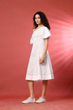 Boho Off-Shoulder White Dress with Crochet Details–This flowy beach dress crochet is ideal for a relaxed, stylish summer vibe