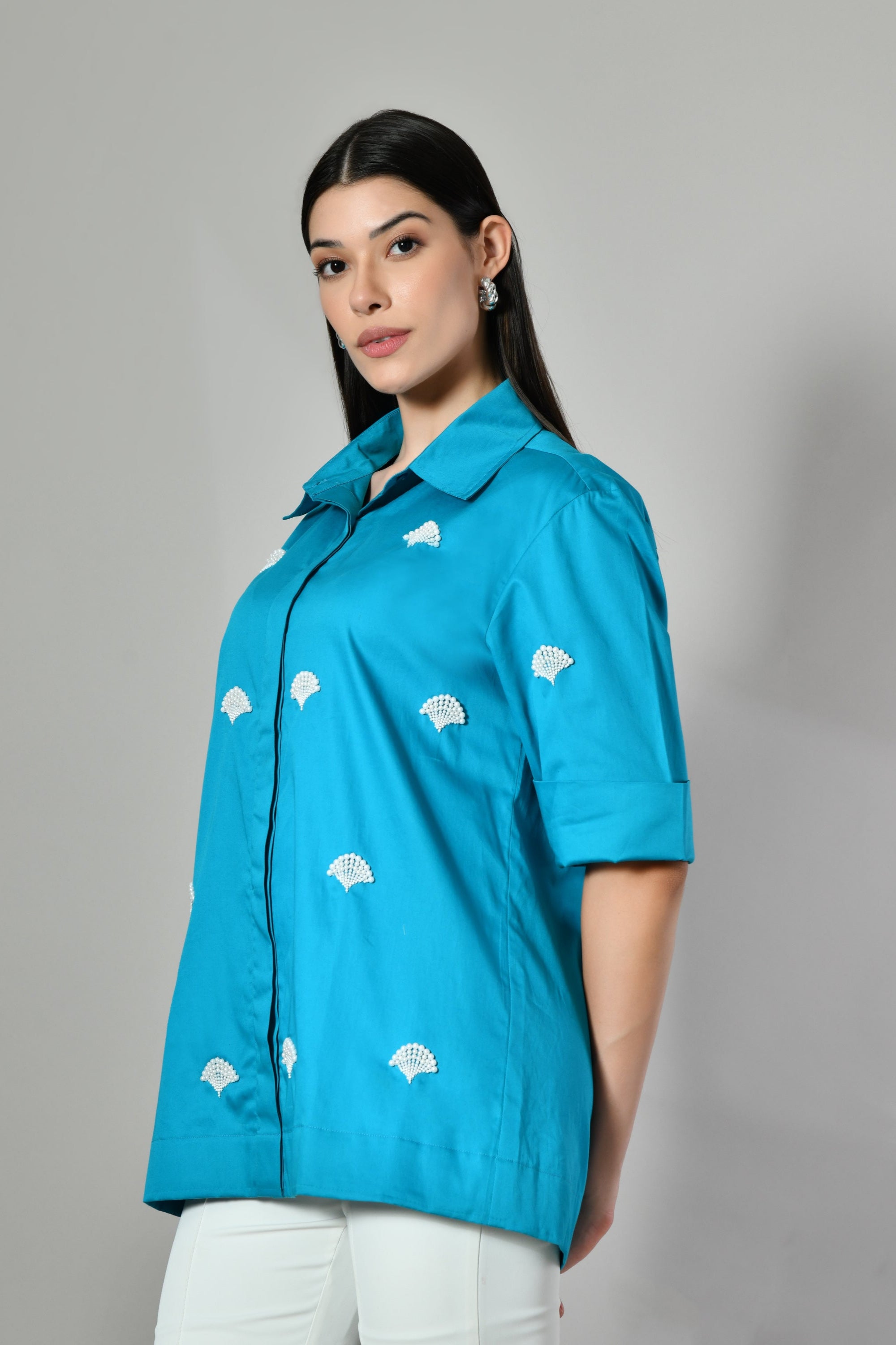 Contemporary ethnic cotton top with pearl work – blue embroidered shirt for women, blending tradition and modern elegance.