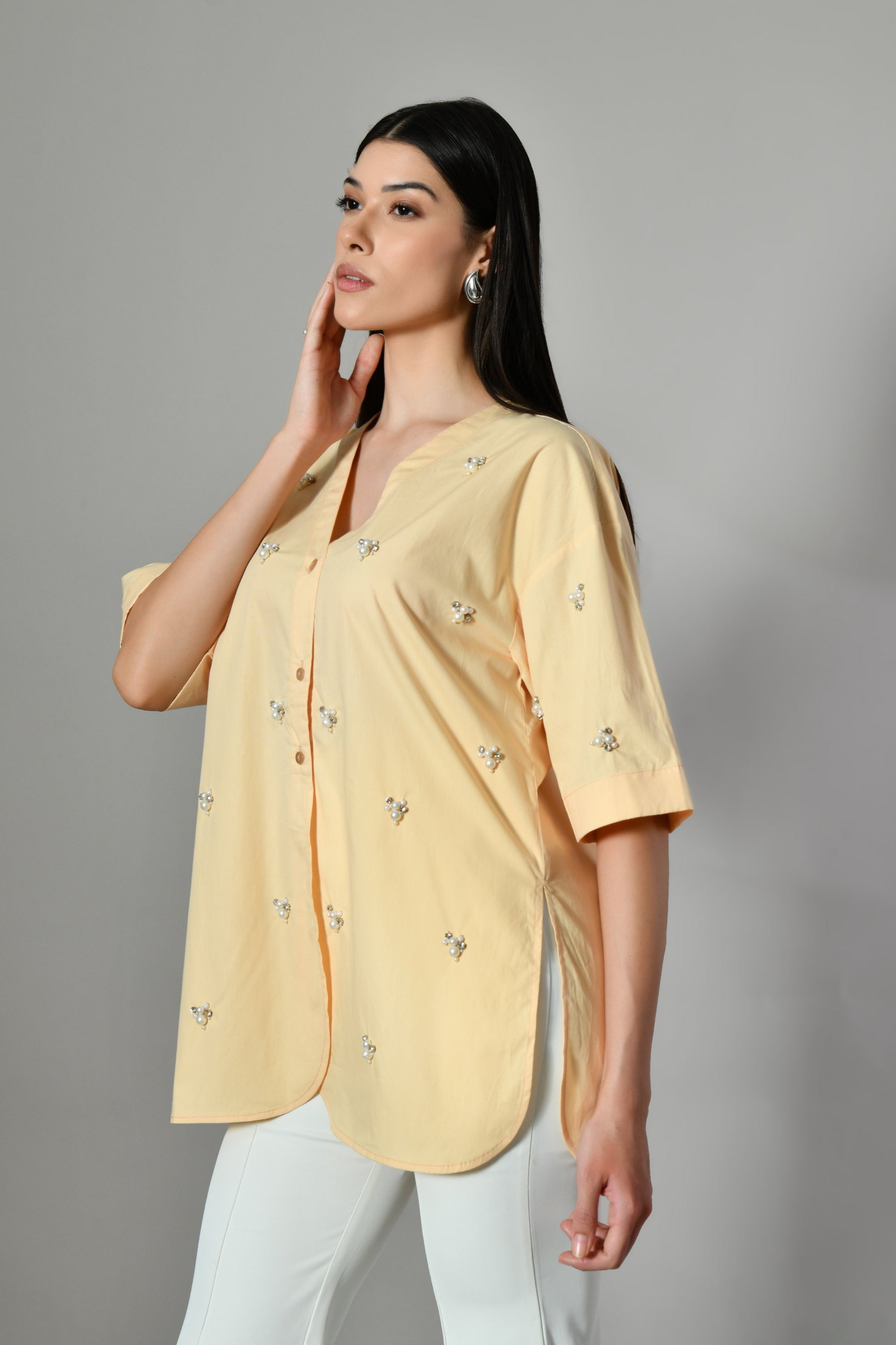 Summer casual pearl embellished shirt for women – pastel yellow cotton designer tunic. Embroidered pastel shirt, Office wear.