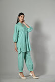 Stylish ladies co ord set – green cotton two-piece with matching trousers, great for day events or vacation wear. 